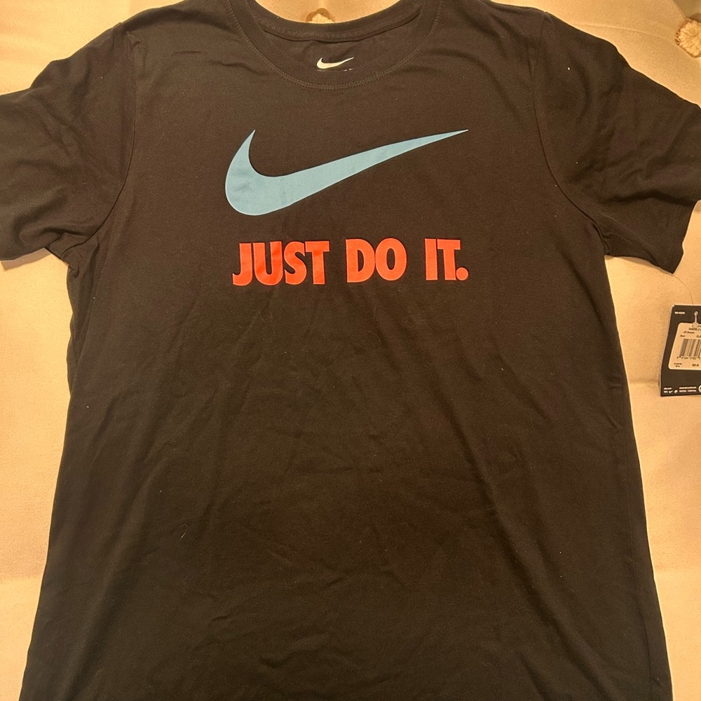 Nike Men's Black Tee with Blue Swoosh and Red Text